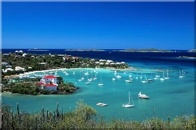 Boats sailing in the waters of Cruz Bay